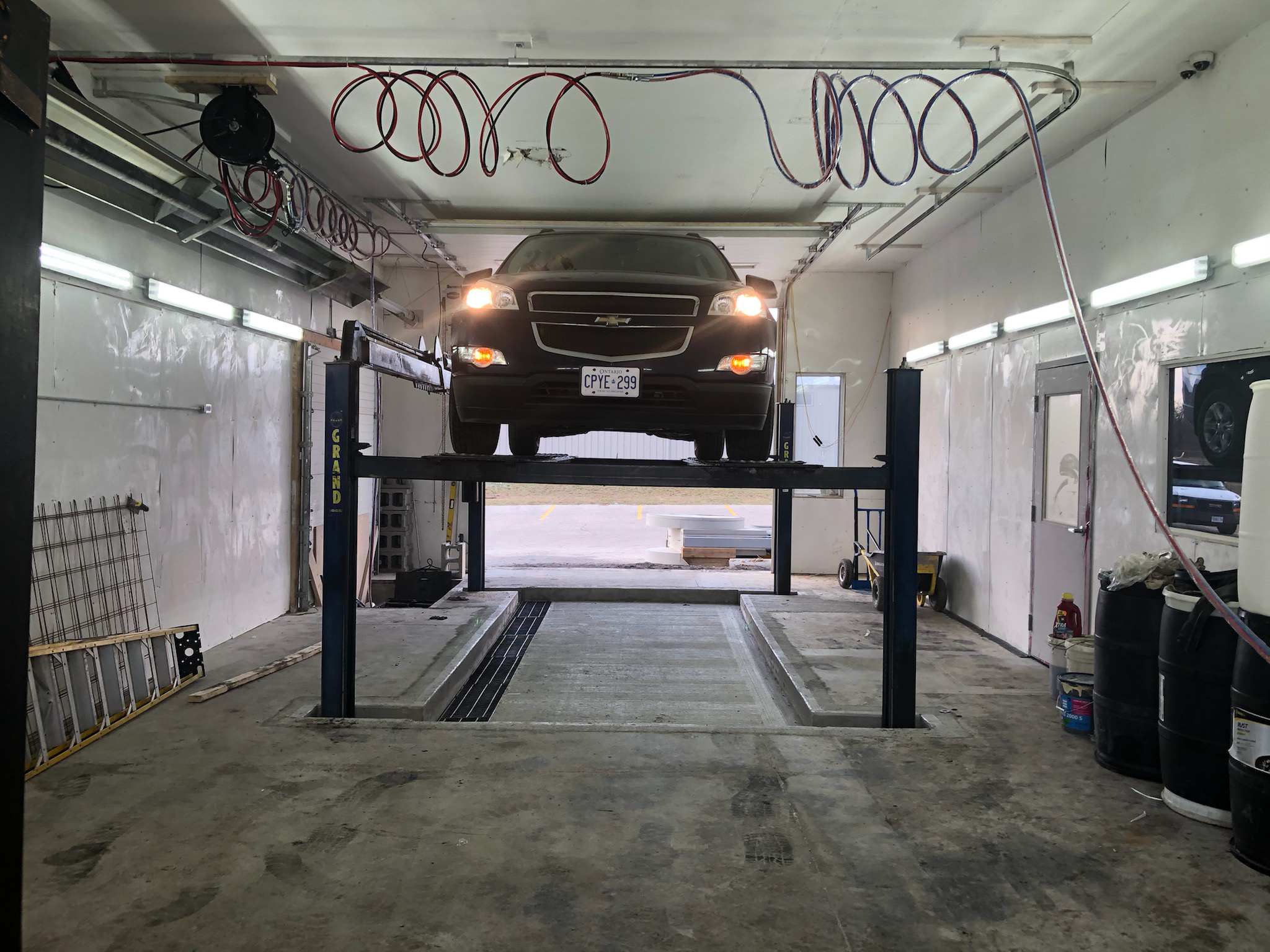 Vehicle on lift in Krown service bay at Regional Auto Glass Simcoe
